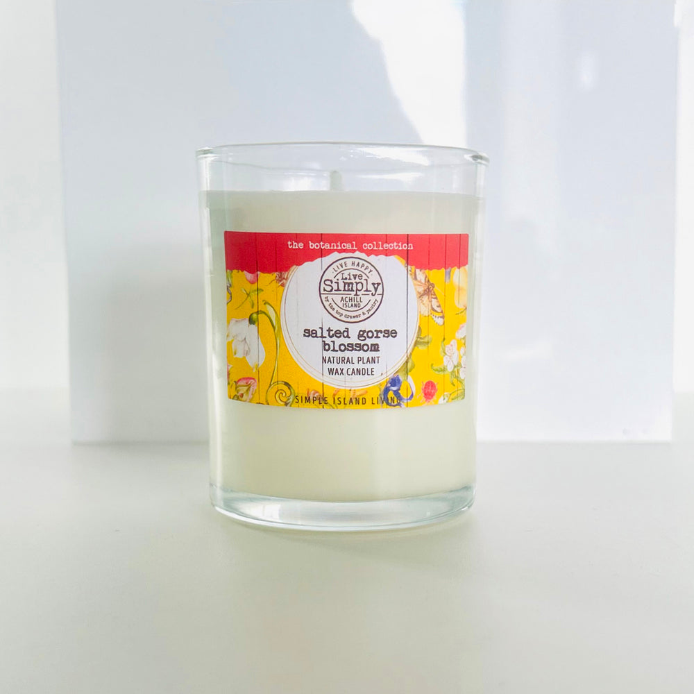 Candle with a colorful label on a white background