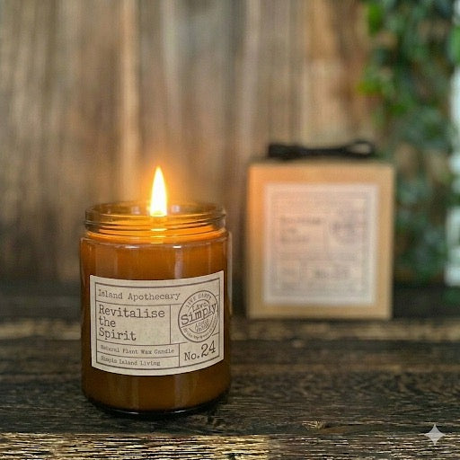 Close-up view of the natural plant wax and botanical label of the Revitalise the Spirit (No. 24) amber jar candle 